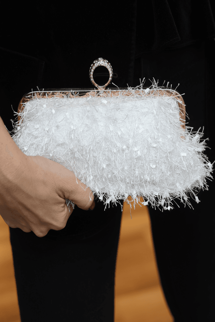 Clutch bag with ring lock with feathers and sequins