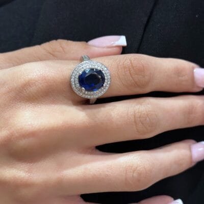 Silver 925° solitaire ring with blue stone and cubic zirconia