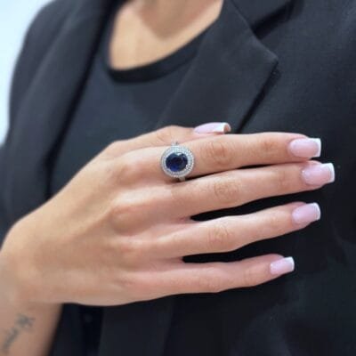 Silver 925° solitaire ring with blue stone and cubic zirconia