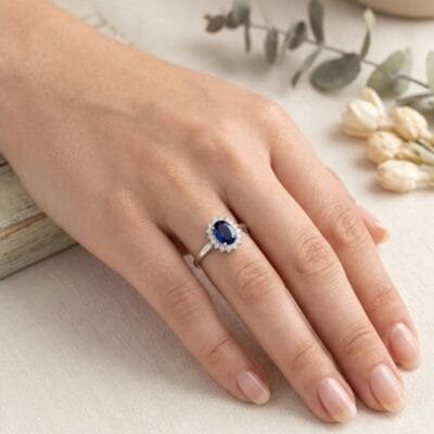 Δαχτυλίδι Ασήμι 925° Μονόπετρο με ροζέτα μπλε πέτρα